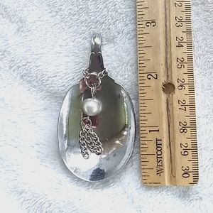 A vintage spoon pendant, silver,  white Pearl.